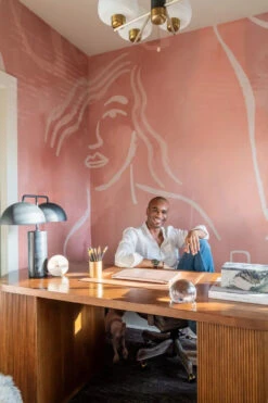 Famke© Mural Wallpaper In Terracotta -Drop It Modern Sales TravisLondonHeadshotDSC07881 Edit 8becc5763bdf4abebf5c9d34898401f7